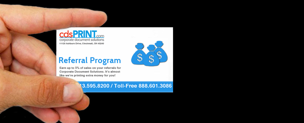 Picture od a hand holding a business card titled referal program, cdsprint referral program, print referral, 